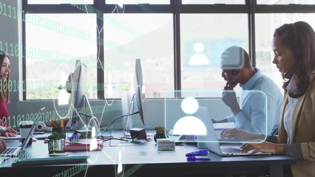 Woman in blazer typing on laptop at desk team joining causing tech network icons enabling teamwork