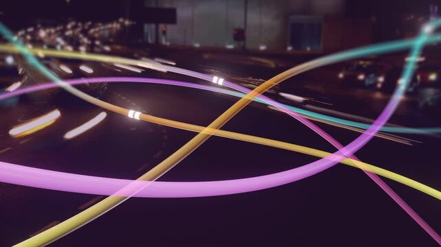 Four LED ribbons weaving, shifting; pink loop entering sparking pulses moving along to show traffic