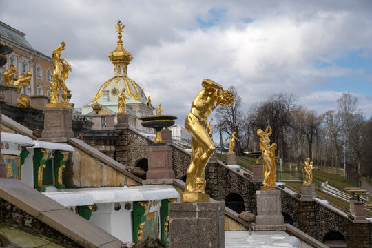 PETRODVORETS, RUSSIA - APRIL 18, 2026: Sculptures of the Grand Cascade under a cloudy morning sky. Architectural ensemble of Peterhof Park