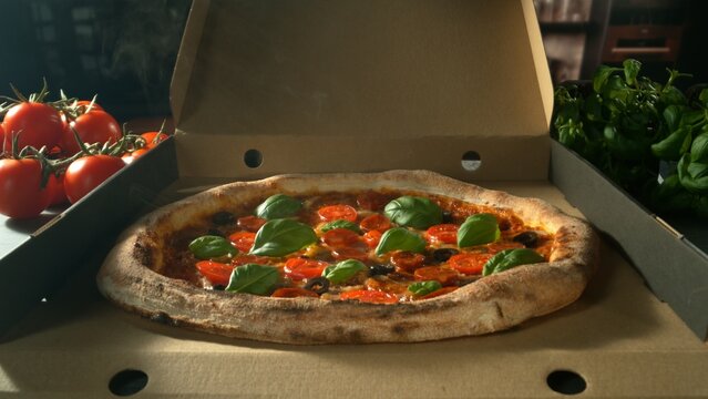 Appetizing piece of pizza lying in an opening paper box