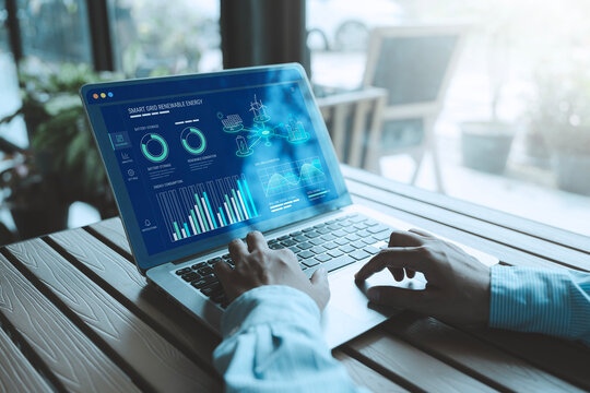 Smart grid renewable energy management concept hands typing laptop dashboard data analysis green energy monitoring system sustainability smart city infrastructure, Digital transformation