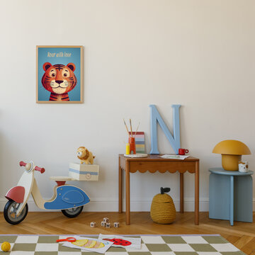 Playful children room with a toy scooter, green toy house and charming stuffed lion under a framed tiger poster.
