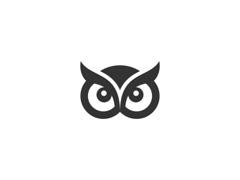 A nice, sharp black owl head for a company logo.