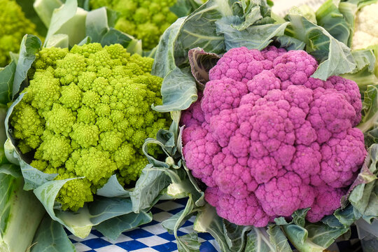 Romanesco and purple cauliflower at farmers market