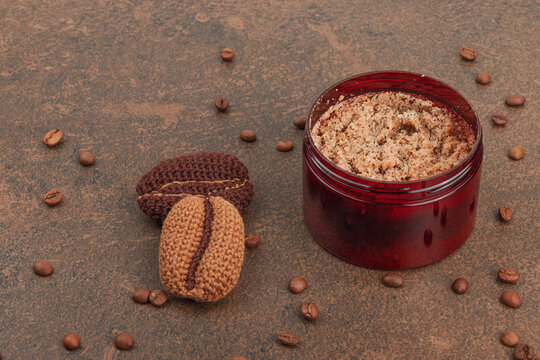 Self care, beauty and cleaning concept. Aroma coffee body scrub, handmade crochet pads