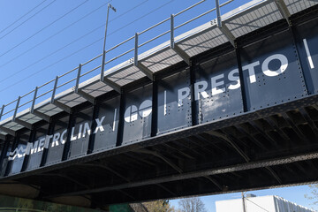 Fototapeta premium Go Transit (Metrolinx) steel overpass on Rogers Rd, Toronto