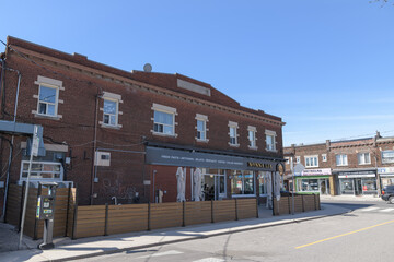 Naklejka premium north elevation of 337 Oakwood Av (location of Nonna Lia, a dessert restaurant) inside historic (Oakwood Hardware), Toronto