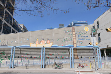 Obraz premium exterior building with mural by Darwin Peters and sign of St. Lawrence Community Recreation Centre, Yorktown On The Park, 230 The Esplanade, Toronto