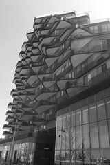 Naklejka premium black and white view of Aqualuna condominiums at the edge of East Bayfront, Merchants' Wharf, Toronto