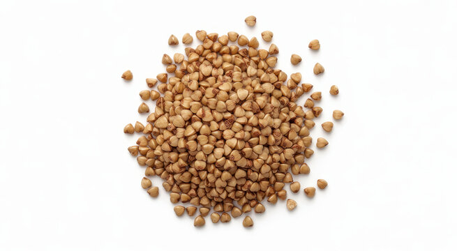 Raw organic buckwheat groats piled in a heap isolated on a white background, for food ingredients