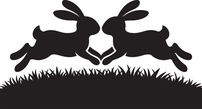 Black silhouette of two rabbits jumping towards each other over a grass field