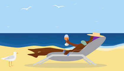 A black woman in a hat lies on a sun lounger on the sea, listens to music and drinks a cocktail © Yuliia