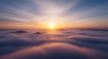 Fototapeta premium Breathtaking aerial view of a majestic sunrise over a sea of clouds, with mountain peaks emerging through the golden mist