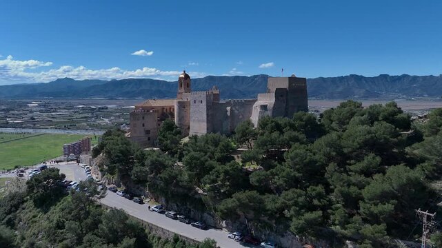 Aerial Drone View of Castell de Cullera Castle on Sunny Day Spain
