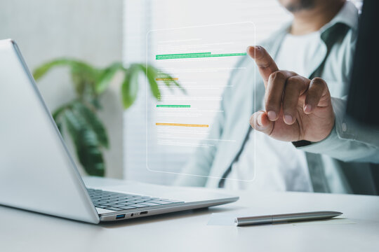 Business professional reviewing digital document with highlight and zoom interface on laptop, representing analysis stage workflow process, data validation, audit checking, corporate quality control