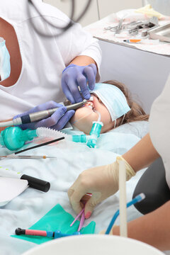 Treatment of baby teeth under anesthesia. Child is under general anesthesia. Breathing tube in baby's mouth. Dental services for children. Concept of modern medicine
