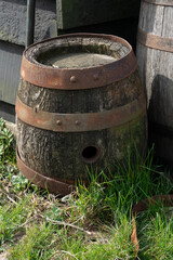 Obraz premium Old Weathered Barrel in Rustic Outdoor Setting