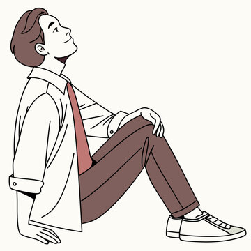 Man sitting and looking up in a relaxed pose