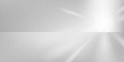 Obraz premium Bright light creating soft reflections on a white surface.