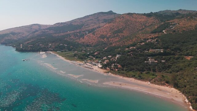 Aerial Orbital Shot of Apraou Bay and Paralia Kalamaki Beach Coastline in Corfu Island Greece
