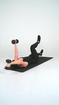 Dead Bug - Female Fitness Model Workout on White Background, Seamless Loop