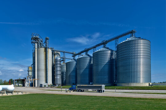 Grain silos serve as critical transportation hubs allowing for the seamless transfer of grain from farms to trucks, trains, and ships.