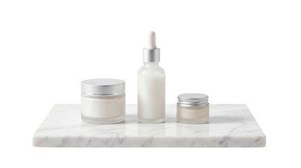 Three white cosmetic products, a dropper bottle and two jars, sit on a white marble slab