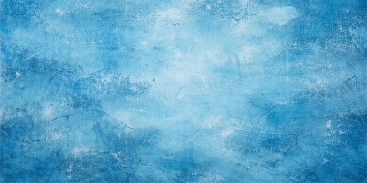Abstract blue grunge background featuring a cold winter sky texture with aged paint on rough vintage paper