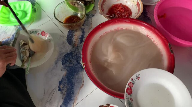 Papeda traditional staple food in Maluku Indonesia. Made from sago served with fish.