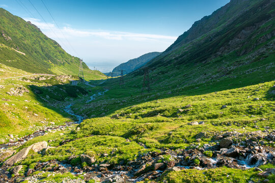 Transfagarasan road through mountains winding uphill. popular highway travel destination of Romania. nice view of mountain on summertime weather. road journey landscape