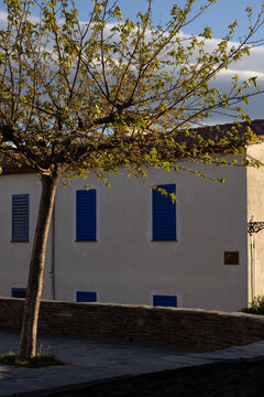 late afternoon shadows, trees, old architecture, Cadaques spain costa brava