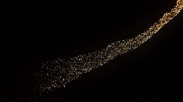 Golden glitter particles forming diagonal glowing light trail on black background representing luxury motion energy sparkle and abstract dynamic beam concept