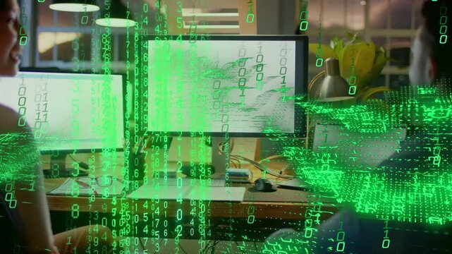 Right coworker gesturing and generating green code streams over monitors and desk, showing analysis