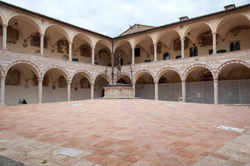 Naklejka premium Courtyard of the Sacred Convent part of the Basilica of Saint Francis of Assisi complex. Umbria, Italy. HORIZONTAL