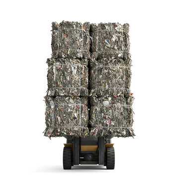 Trash bales stacked on forklift in industrial recycling facility  