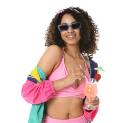 Woman with cocktail wearing stylish swimsuit and sunglasses on white background