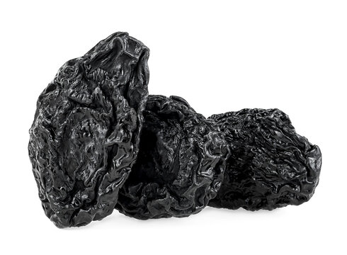 Sweet prunes isolated on a white background. Fruit of dried prunes. Dried plums.