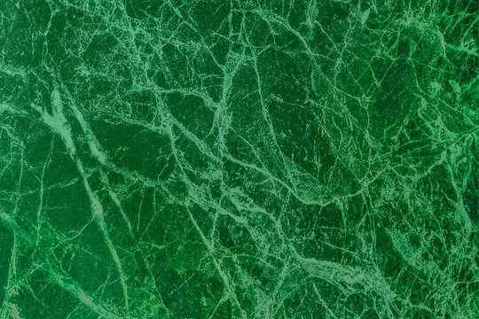 Malachite slab green marble verdant surface cracks kitchen interior structure abstract cracked pattern texture emerald background