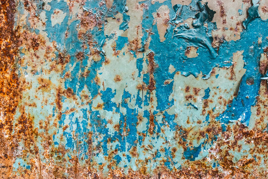Old peeling blue paint weathered dirty worn rusty obsolete metal texture messy background rust steel
