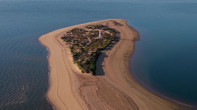An aerial view of Bahia De Los Angeles in Baja California Mexico during sunrise. It highlights the beach and camping options.