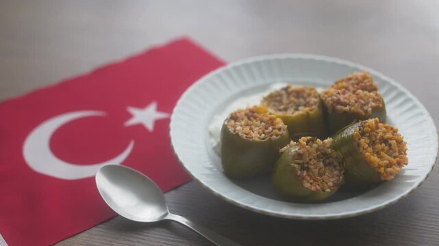Close-up of Aegean style stuffed grape leaves on the Turkish flag