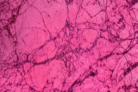 Pink soft color marble surface cracks kitchen interior structure abstract cracked pattern texture floor tile background