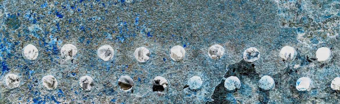 Texture old weathered worn messy obsolete dirty barbecue round cold blue color holes pattern abstract