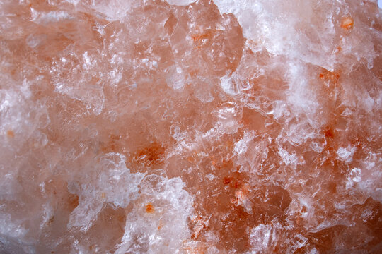 Himalayan pink salt close-up. Natural abstract background. Selective focus