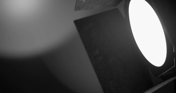 Cinematic Scene Showcasing Moody Studio Lighting And Equipment