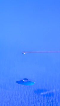 Super Slow Motion Syringe Needle Droplet Closeup 