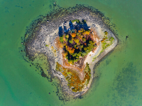 Button Island in fall aerial view in Hingham Harbor in town of Hingham near Boston, Massachusetts MA, USA. This Island belongs to Boston Harbor Islands Park. 