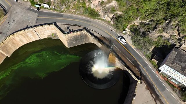 Aerial view of san roque dam funnel spillway in cordoba argentina