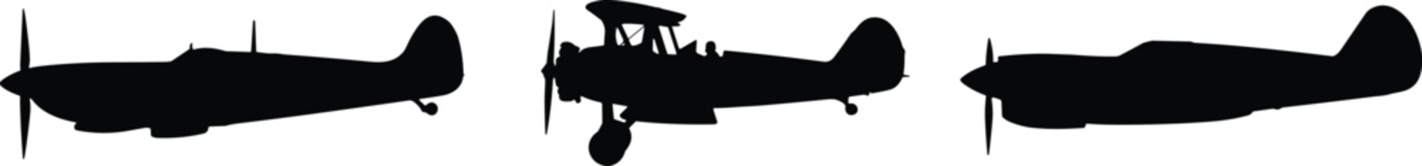 Three vintage airplane silhouettes including biplane and propeller aircraft isolated on white background for aviation history and retro travel concepts © IconicCreations