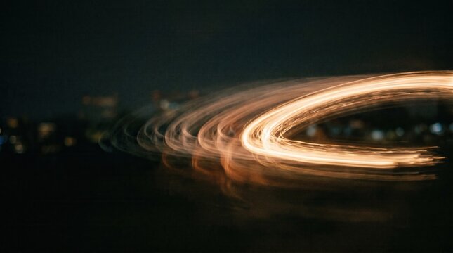 Kinetic light trails and golden motion blur on dark background representing speed and energy, ideal for technology presentations, website hero banners, and corporate branding materials